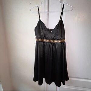 Cute mi Ami little black dress with gold accent belt !